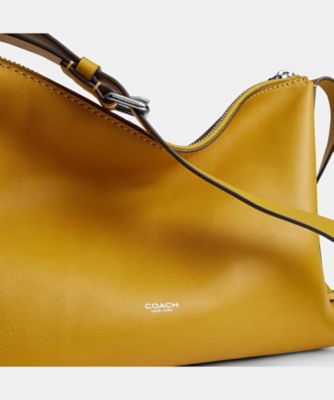 モット メッセンジャー バッグ 33 | COACH/コーチ | 三越伊勢丹